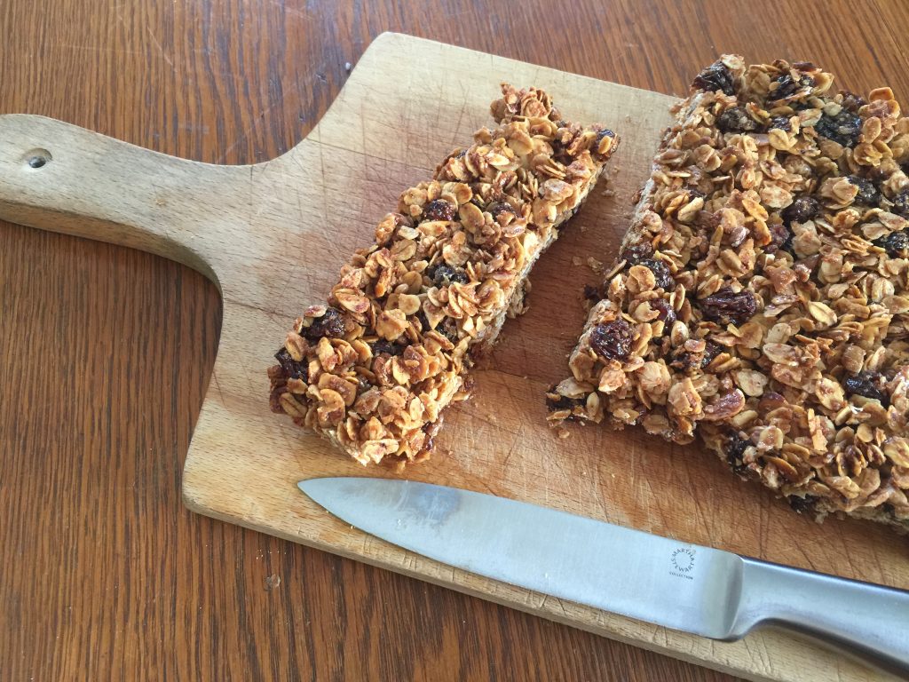 Homemade Granola Bars on Wooden Cutting Board